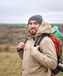Melik carrying his hiking gear